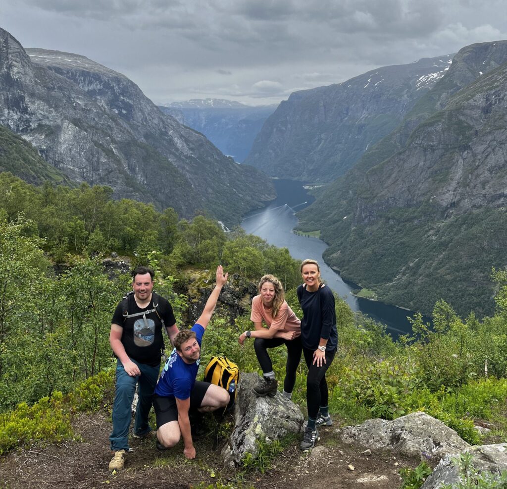 4 people posing on a hike near Bakka, Norway - Kayaking - Norway fjord - hiking in Norway - kayaking - from Brussels airport