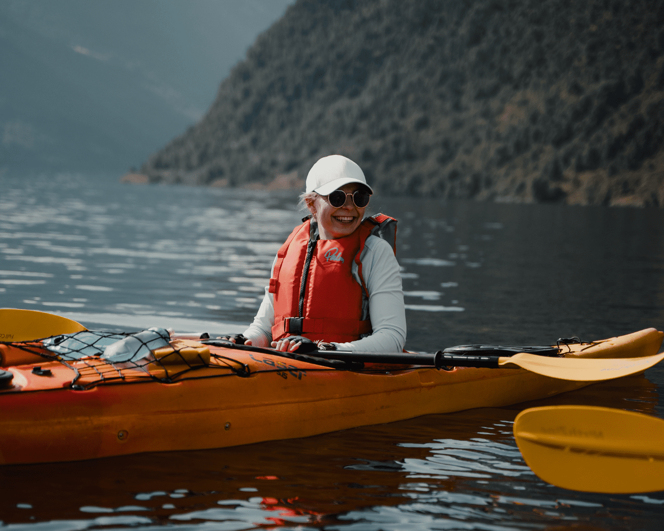 Laughing girl in a kayak - Kayaking - Norway fjord - hiking in Norway - kayaking - from Brussels airport
